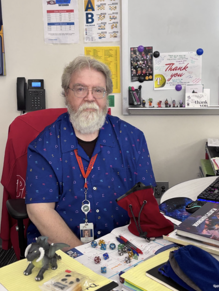 Mr. Hanna with the D&D game tools.